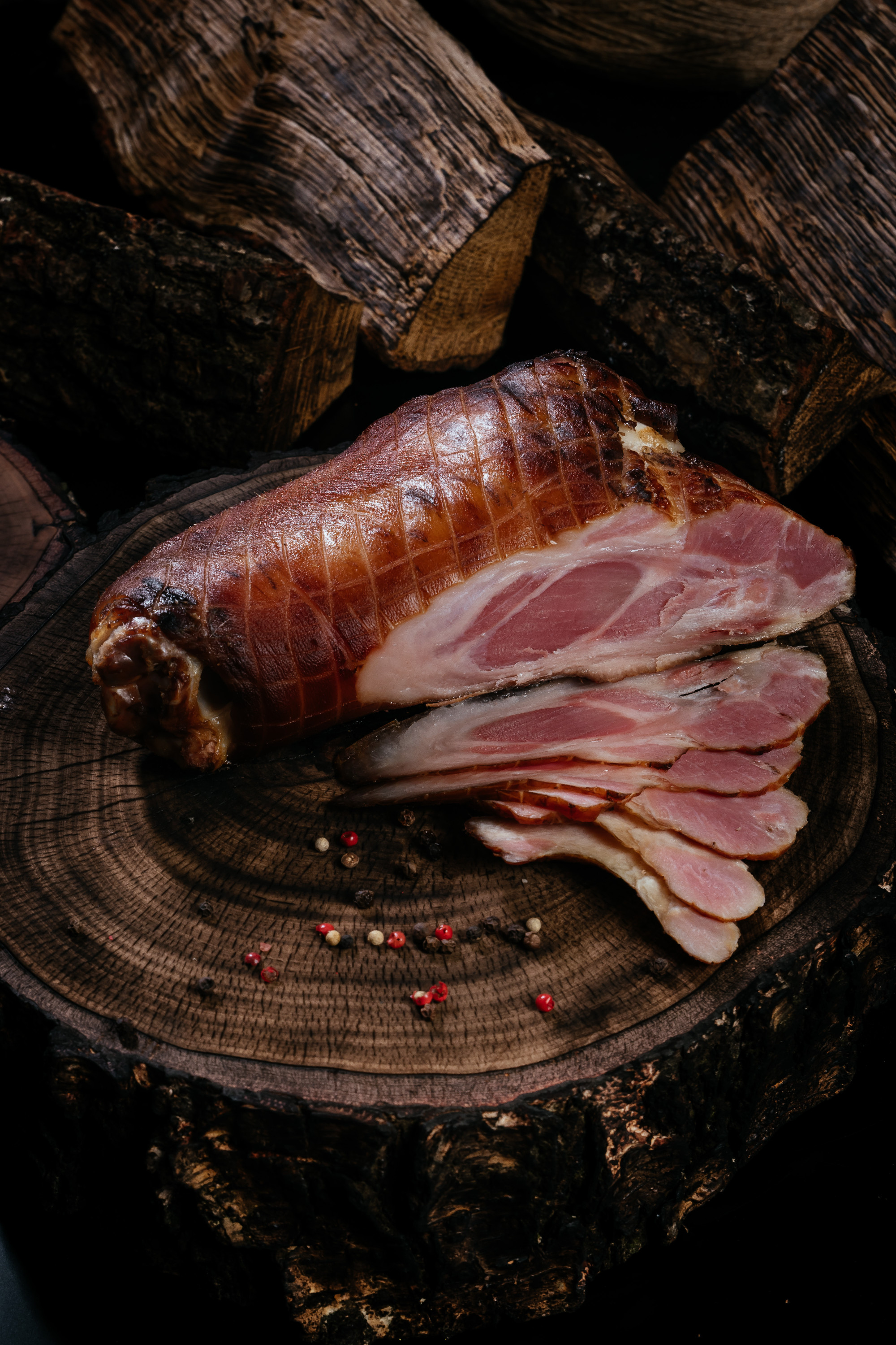 Golden, fresh, appetizing pork ham, pork leg, smoked, grilled, BBQ. Snacks for beer, for gourmets. Natural homemade food.