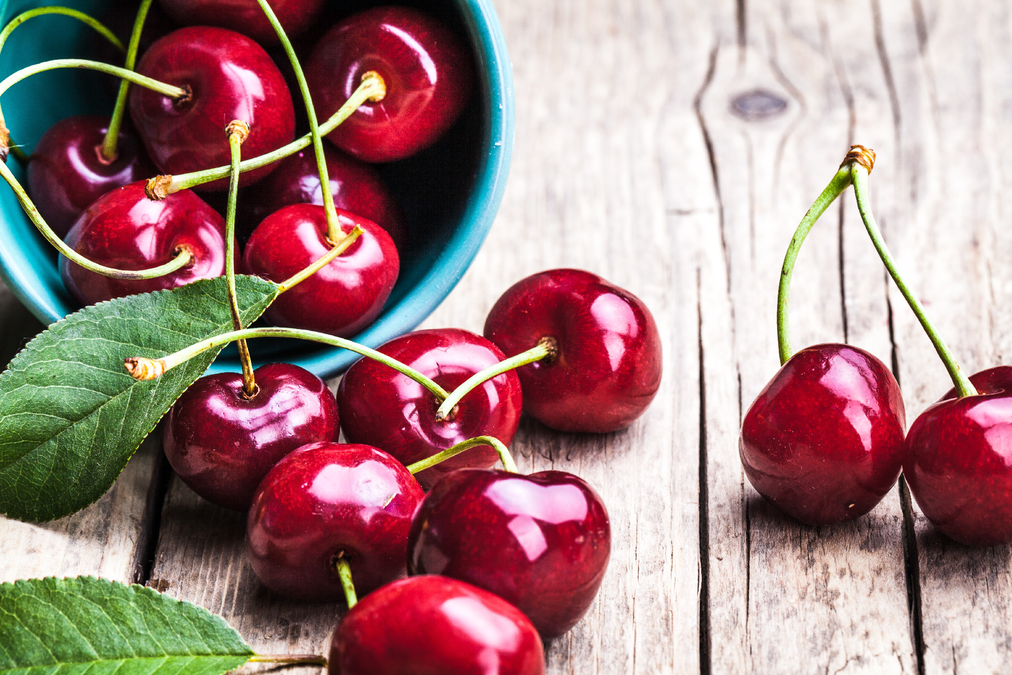 Cherries on wooden table, macro background, fruits, berries