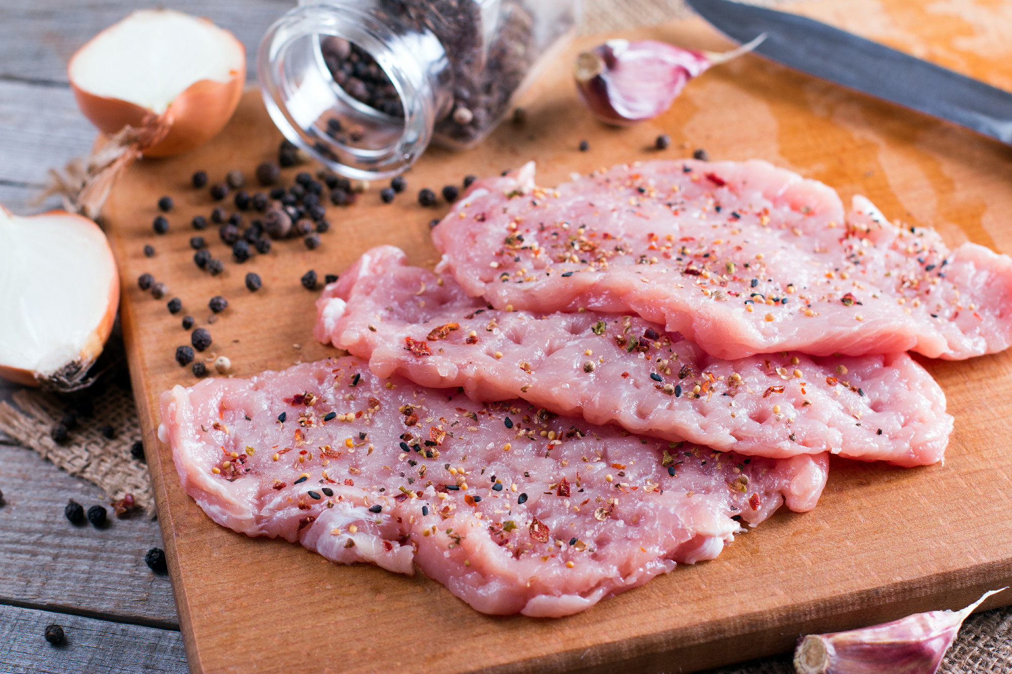 Raw pork Schnitzel ready for cooking