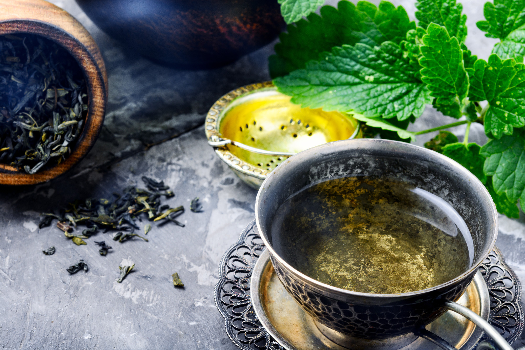 Tea with green fresh melissa leaves