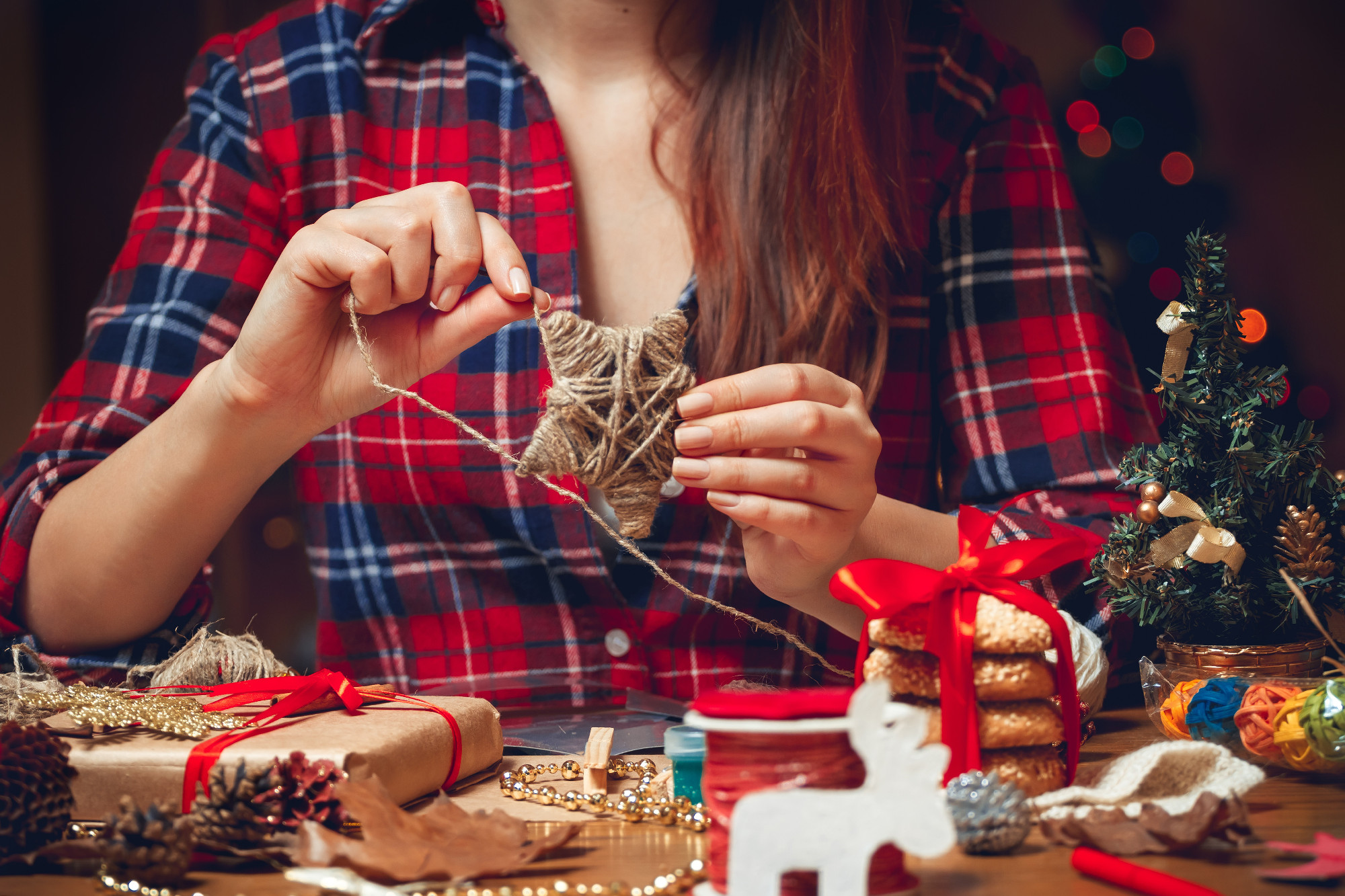 Woman creates a woolen star