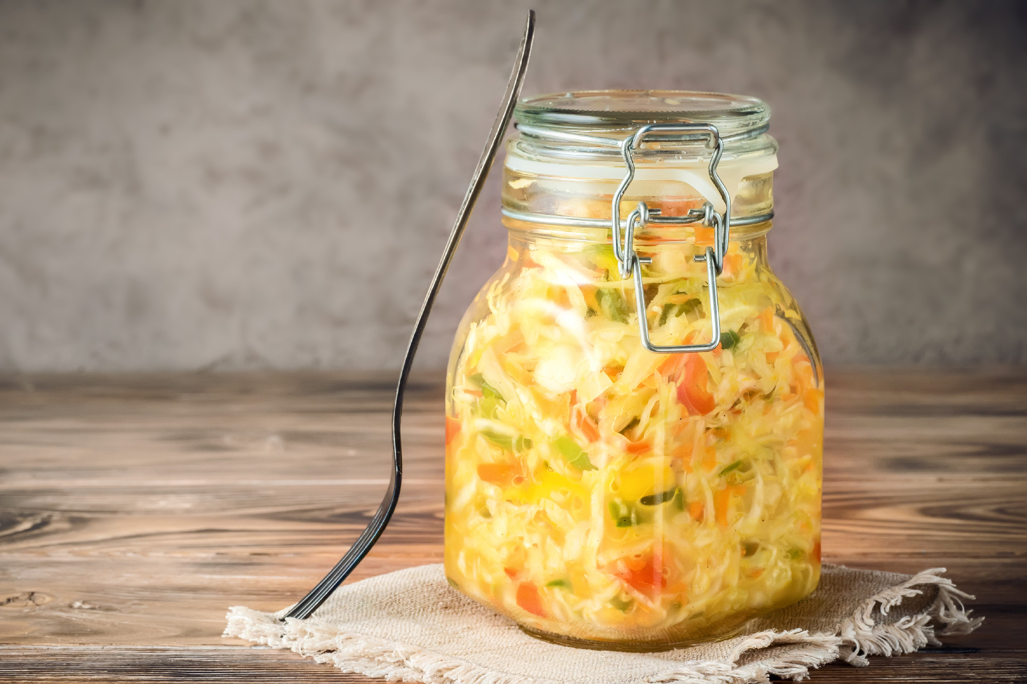 Salad appetizer of fermented vegetables sauerkraut carrots and peppers