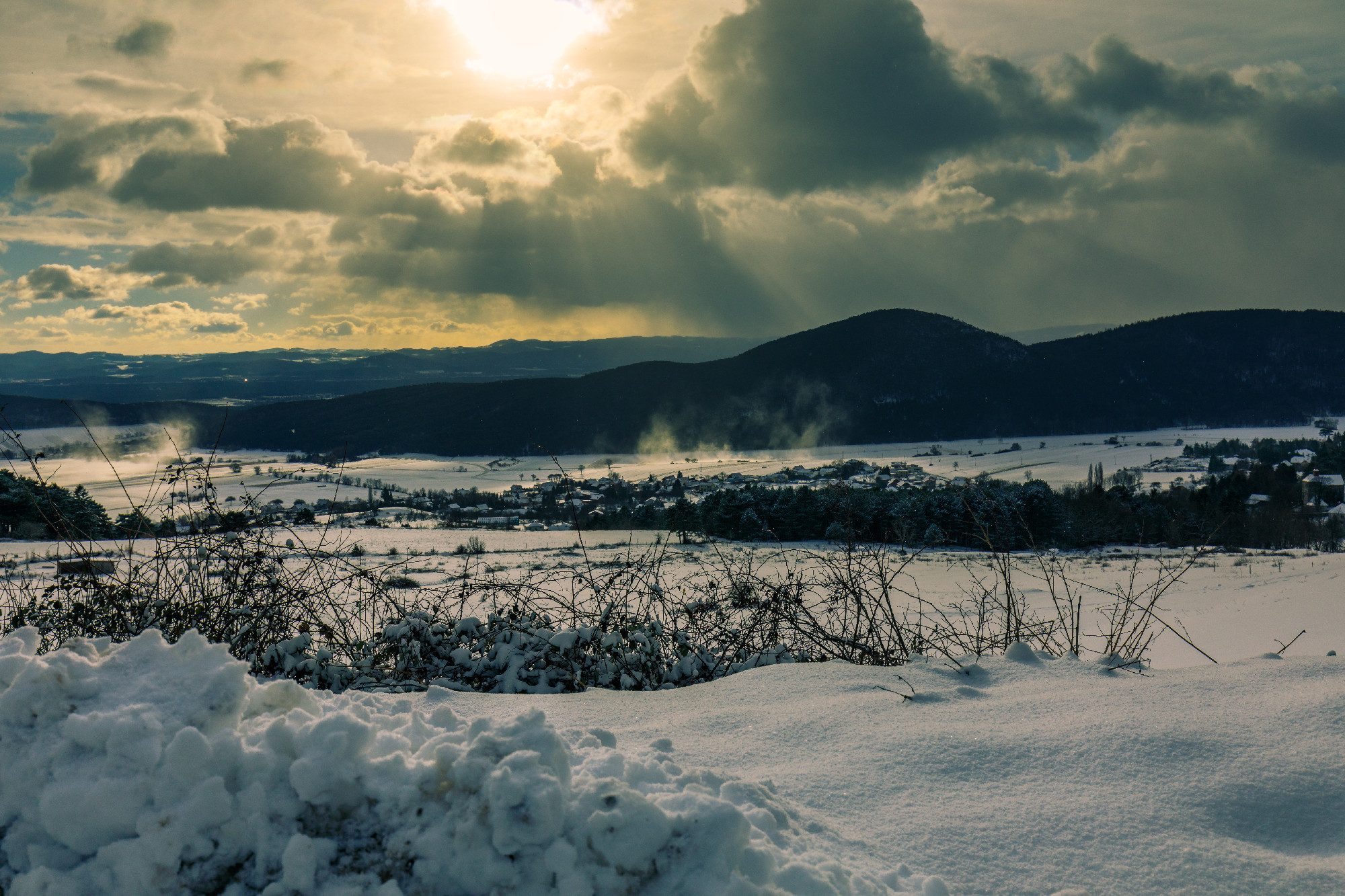 Fantastic sunrise winter landscape. Dramatic overcast sky.