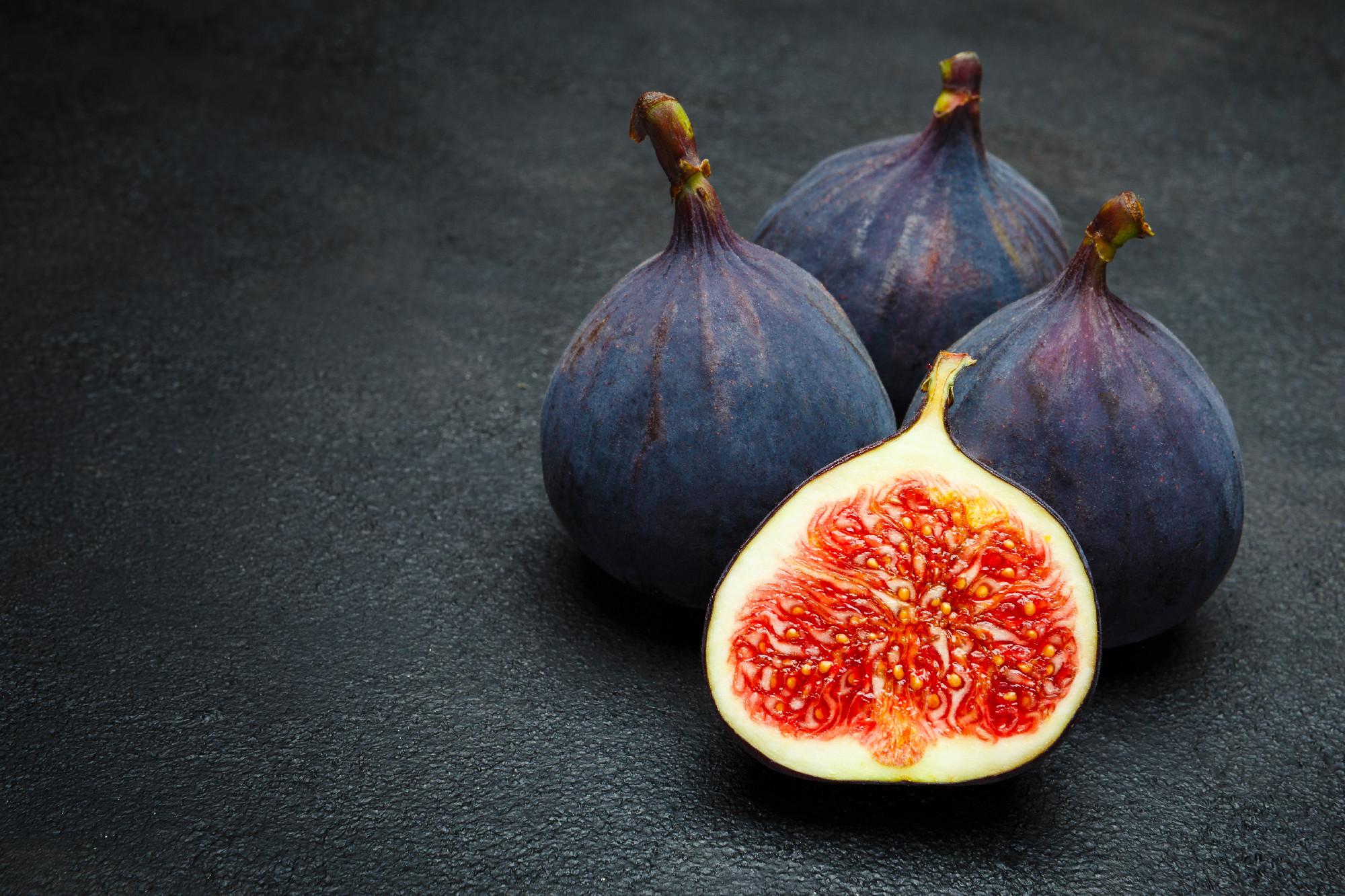 Fig isolated on dark concrete background