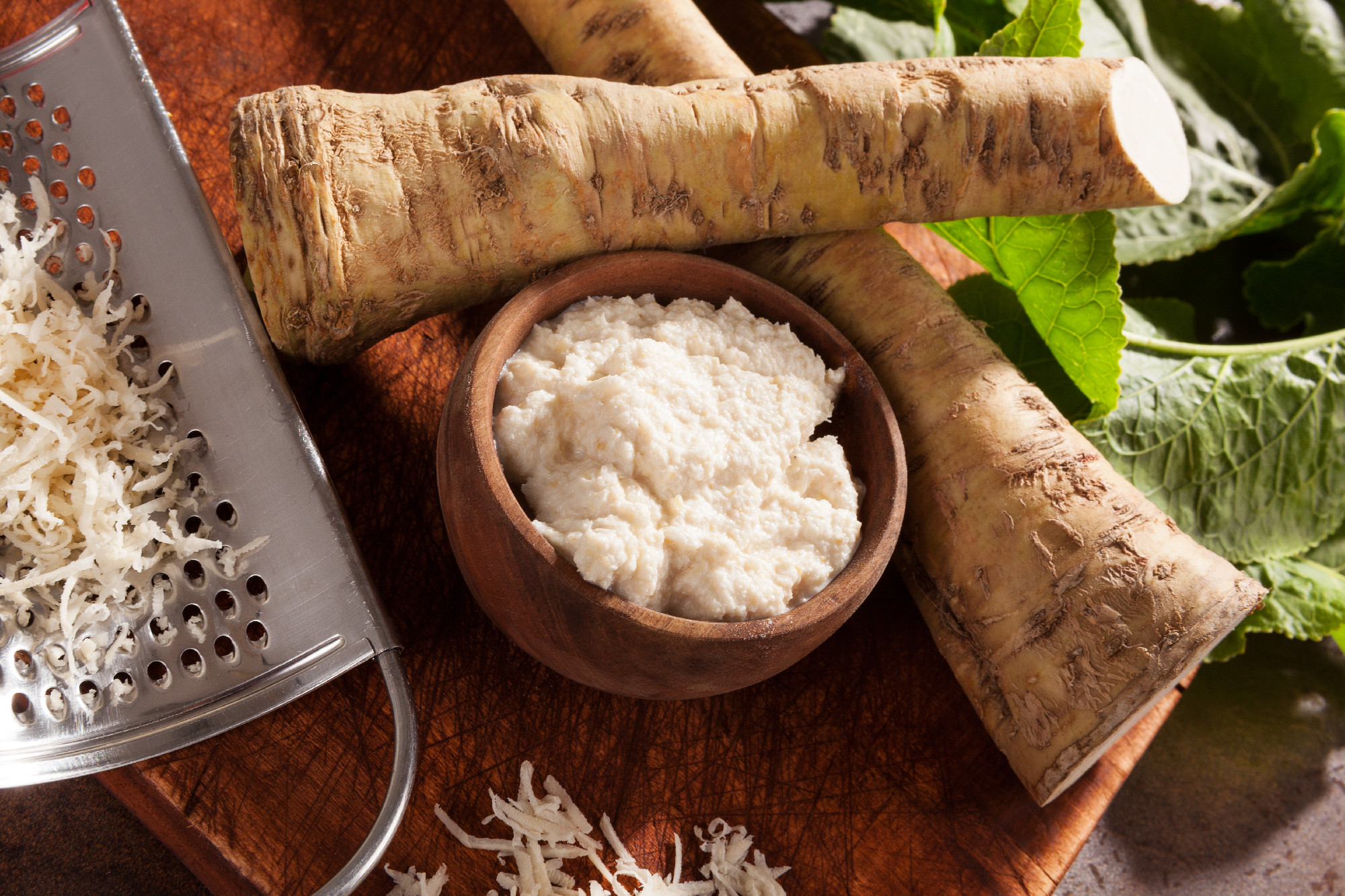 Raw horseradish roots and grated horseradish.