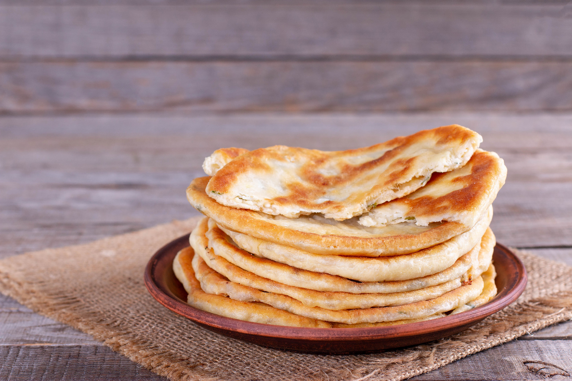 Frying flatbread filled with cheese