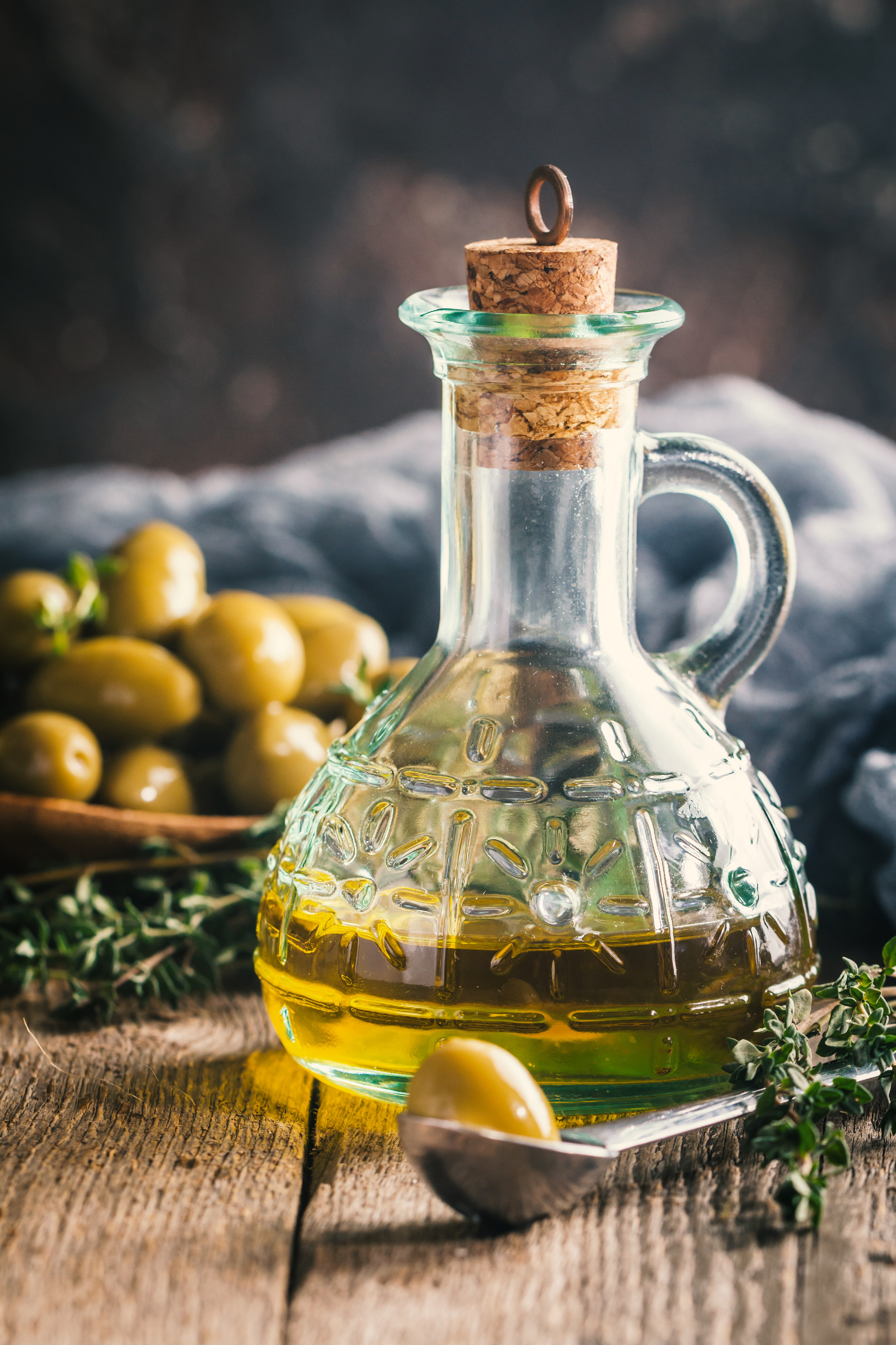 Olive oil and bowl of olives