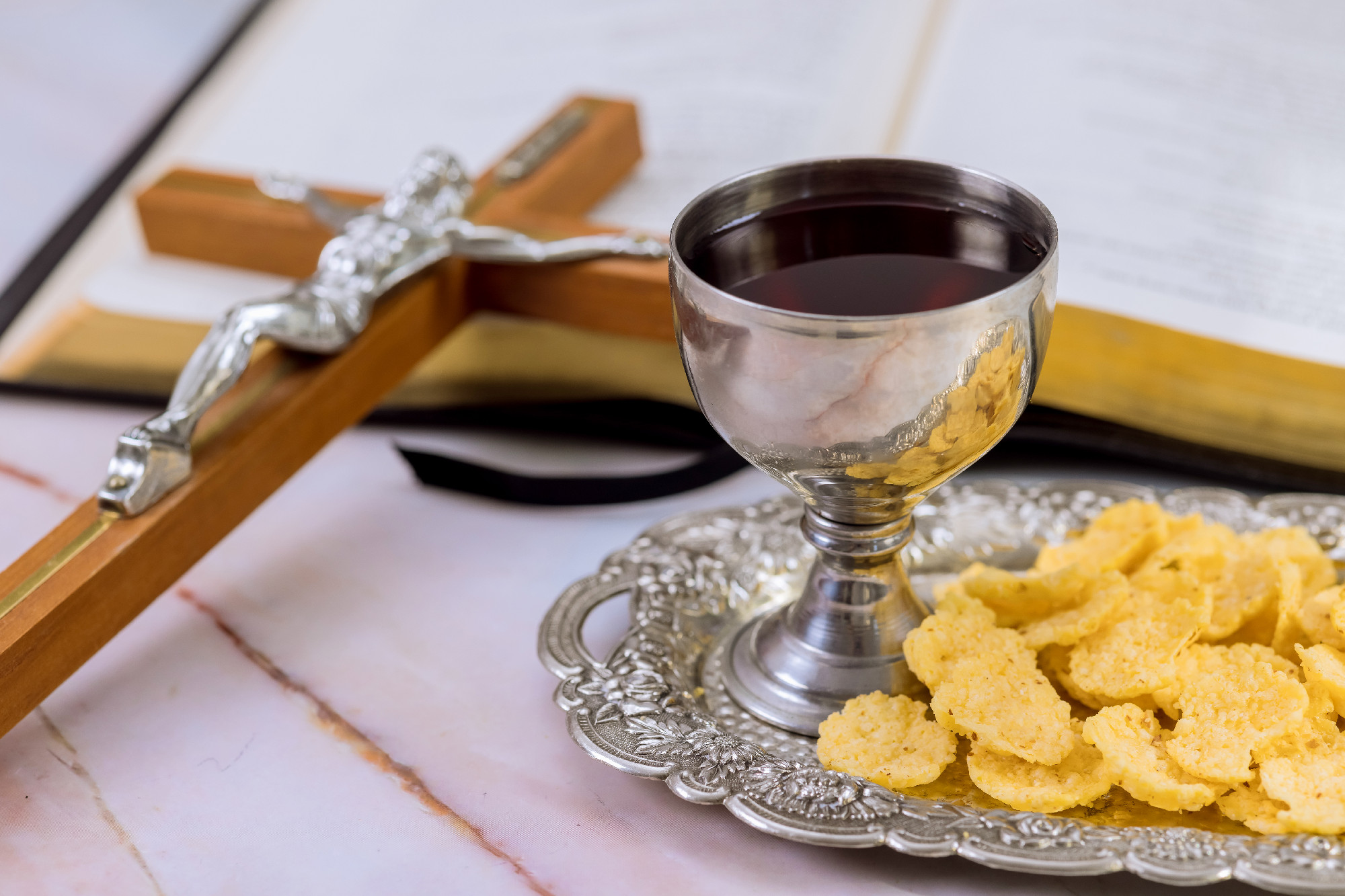 The Christian Holy Communion is a feast of unleavened bread, chalice wine, and the symbols of the death and resurrection of Jesus Christ