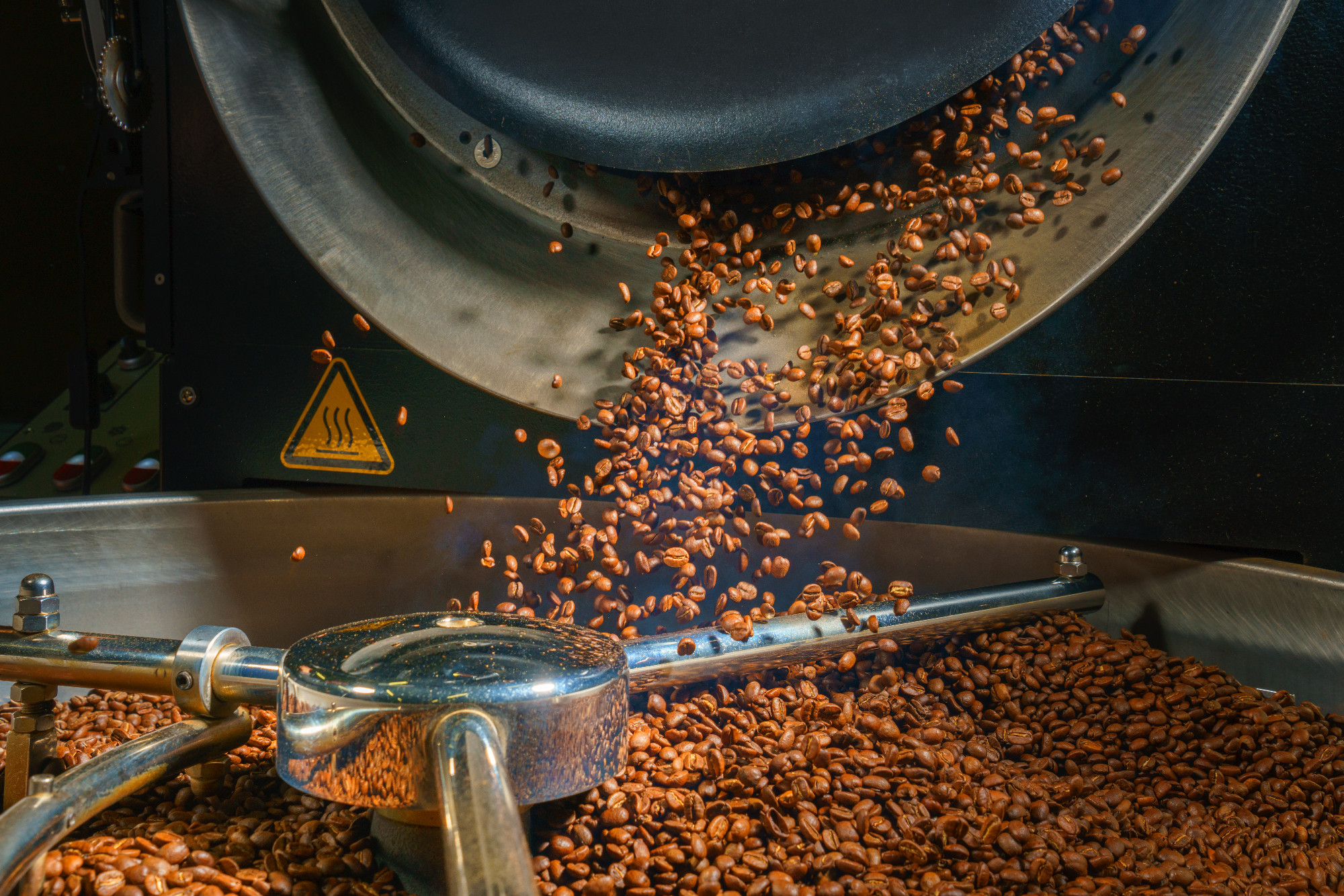 coffee bean roasted in a machine with motion blur