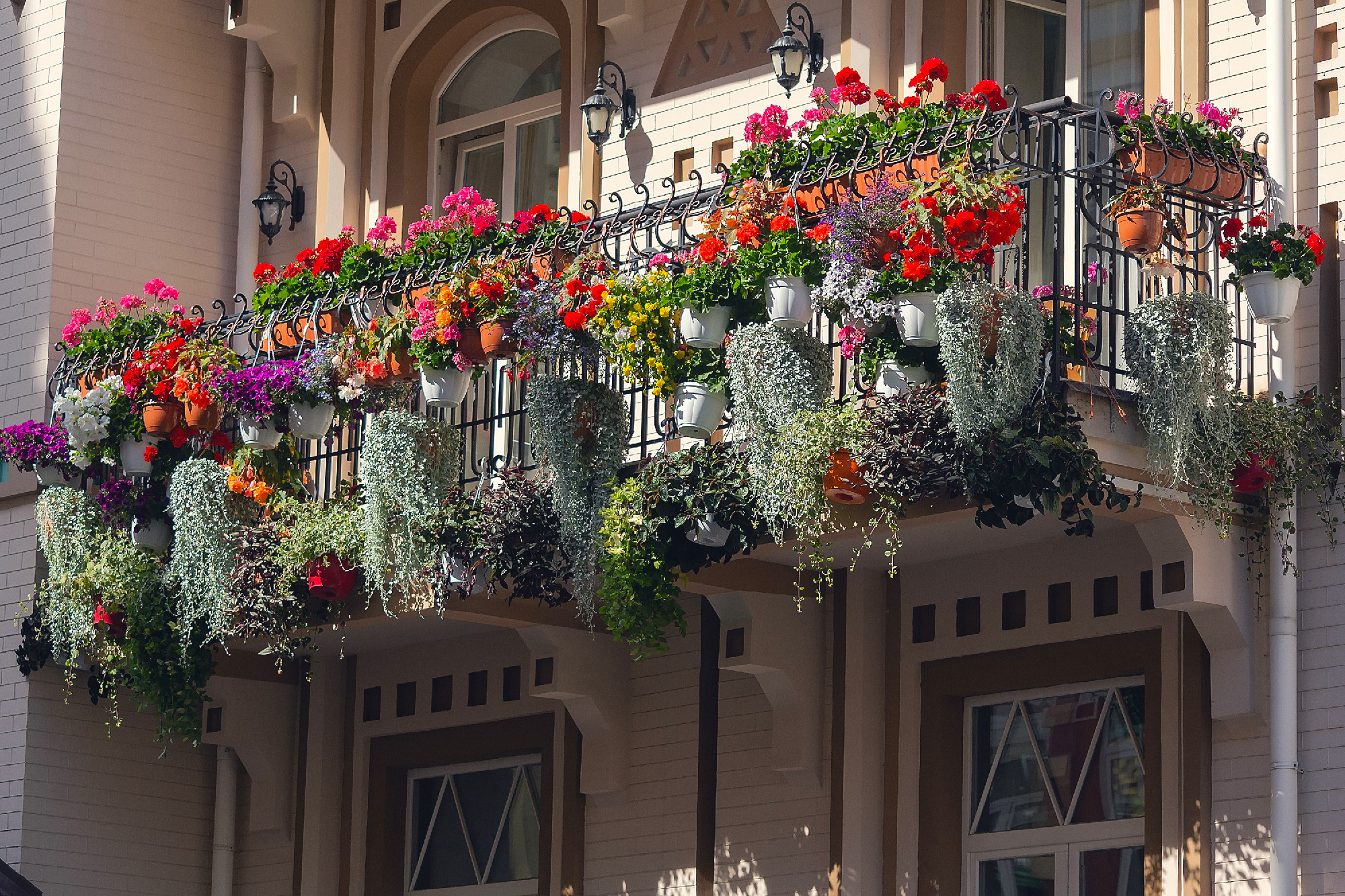 Flowers on the balcony of a luxury house in a classic style
