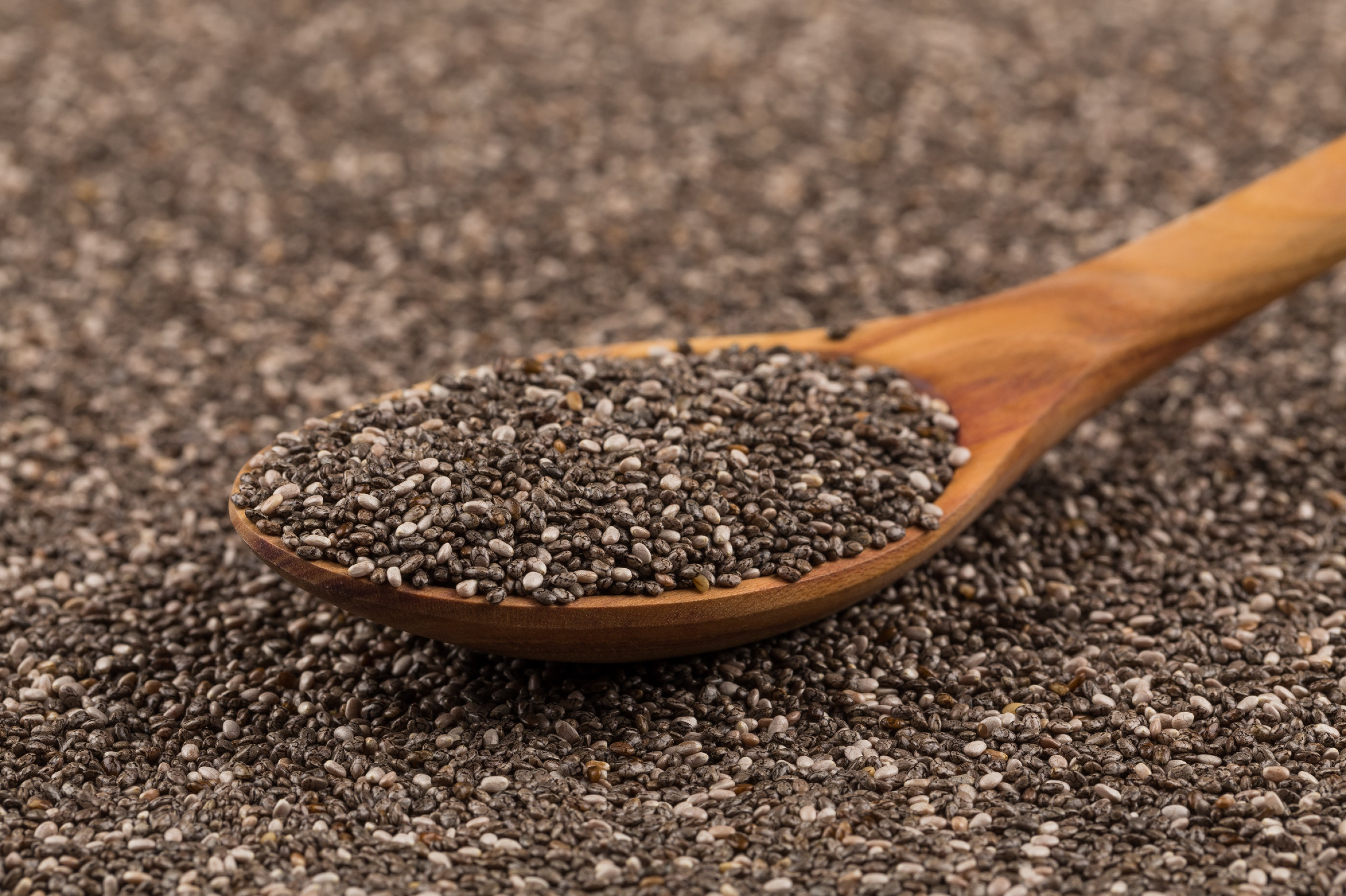 Chia seeds in wooden spoon