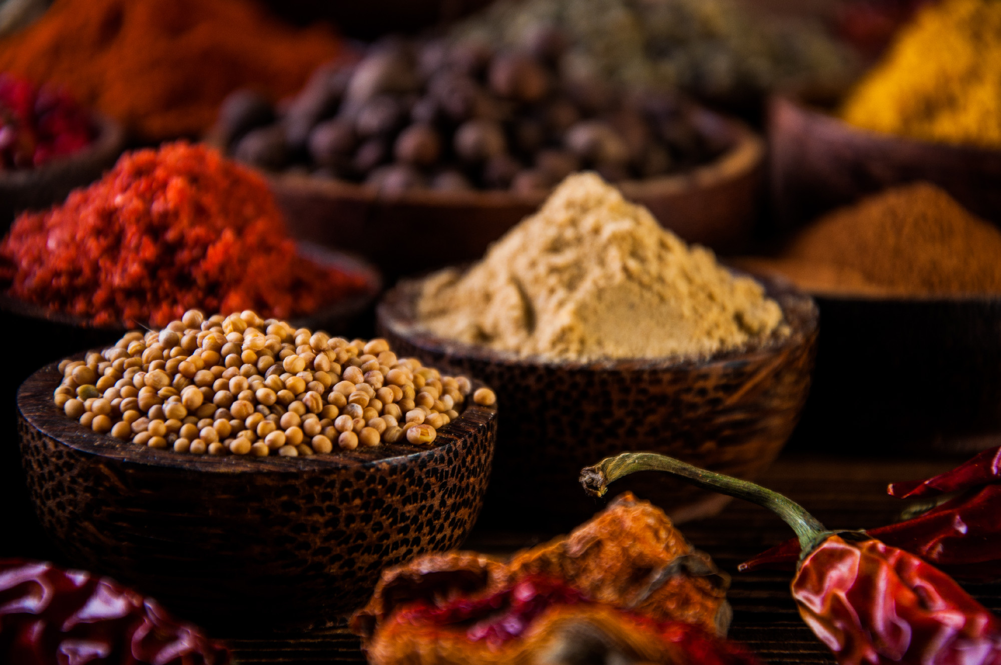 Wooden table of traditional Asian spices