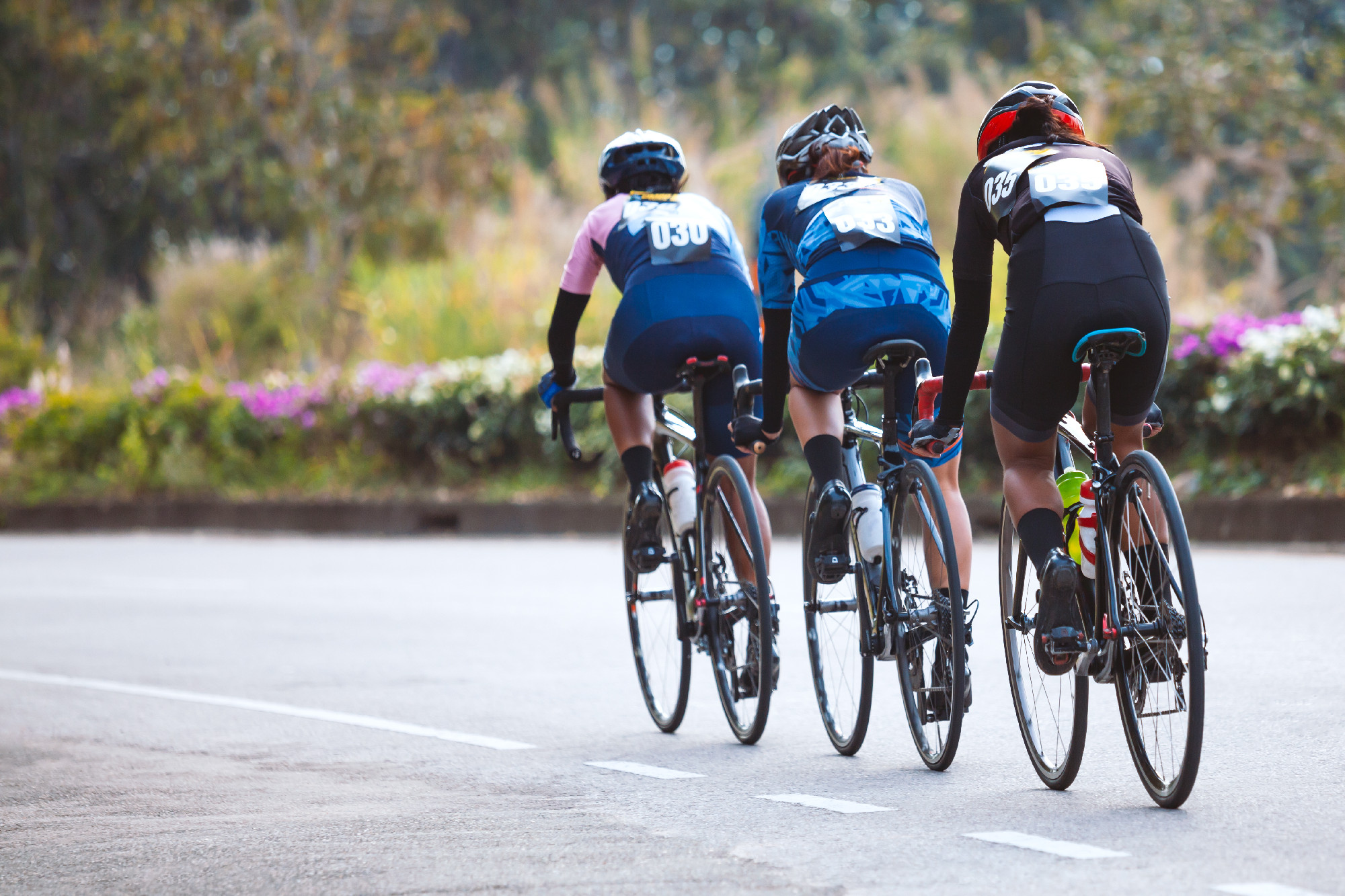 Group of professional cyclists during the cycling race. Shot in