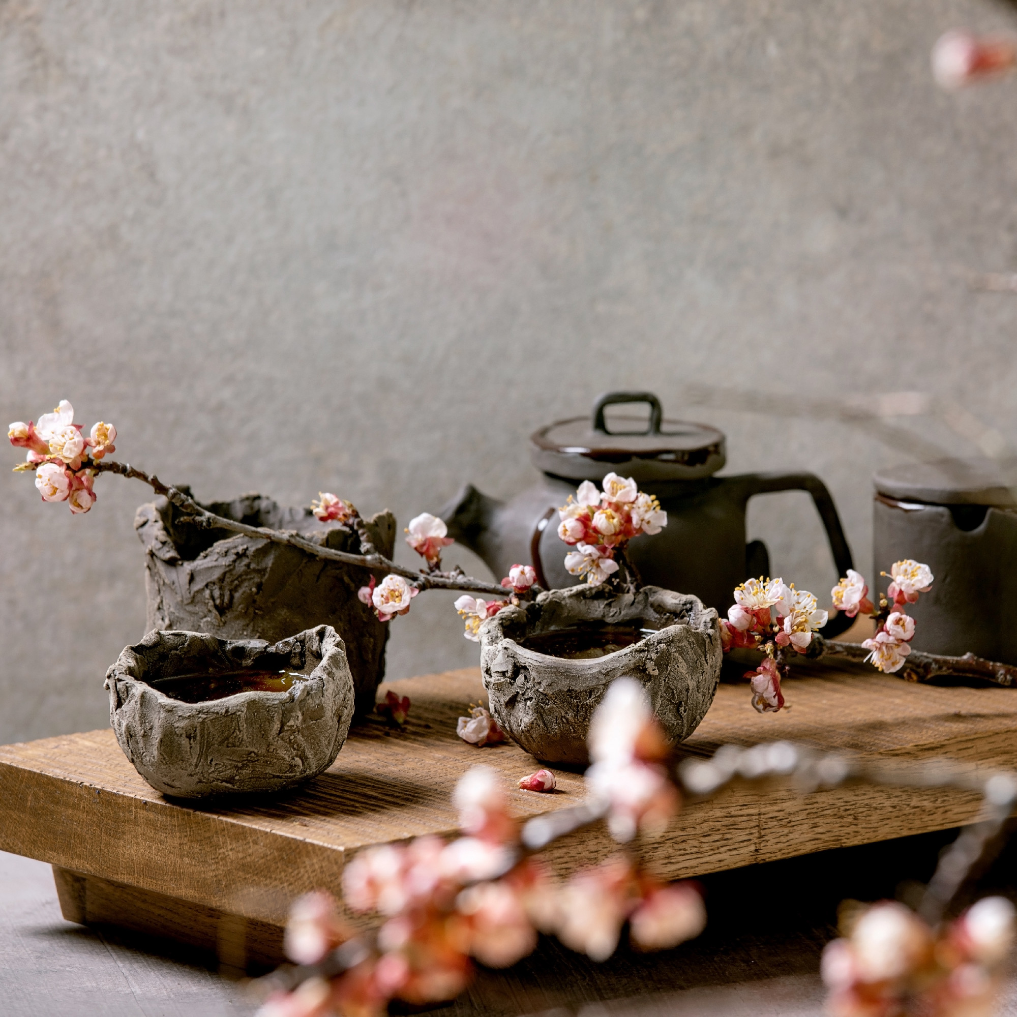 Tea drinking wabi sabi japanese style dark clay cups