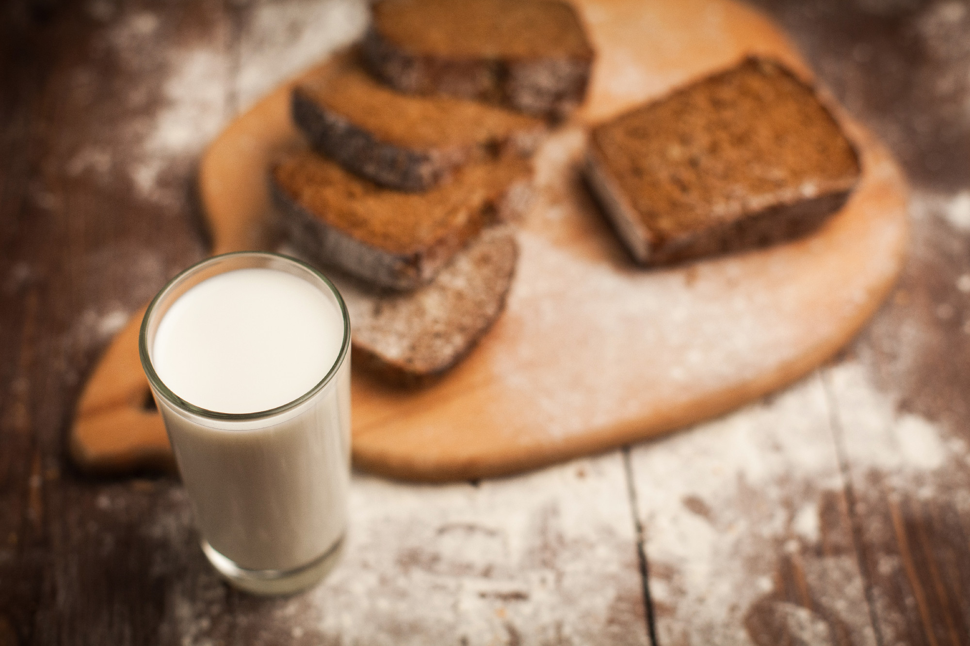 Milk and bread on table. still life