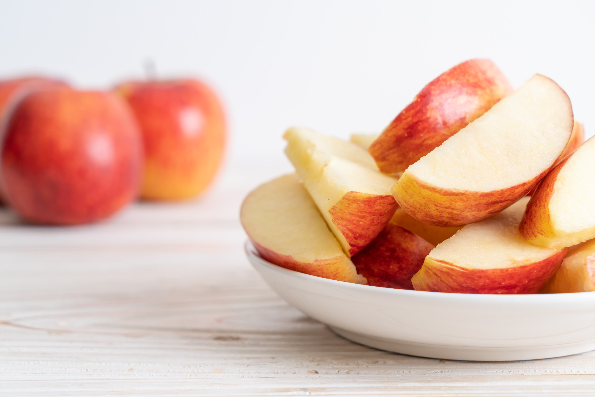 fresh red apples sliced bowl