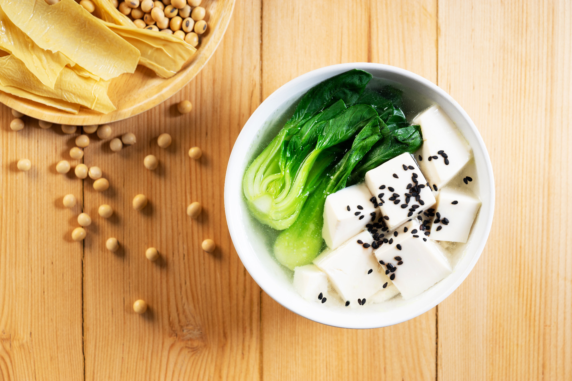 Tofu soup on wooden background
