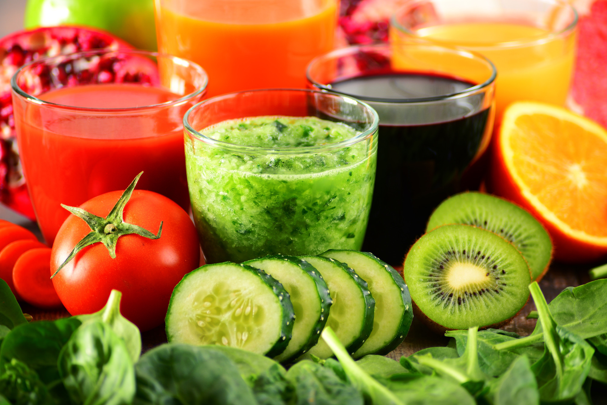 Glasses of fresh organic vegetable and fruit juices