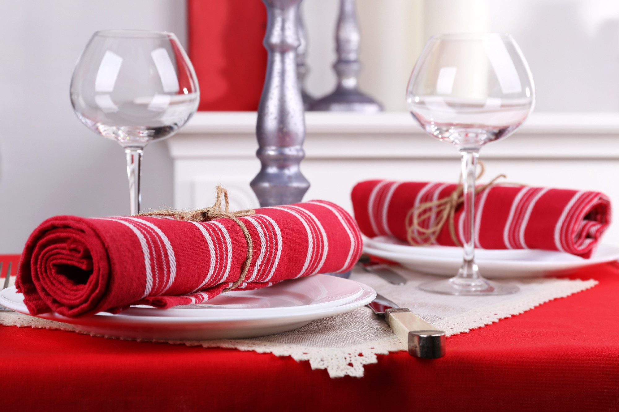 Festive table setting on room background