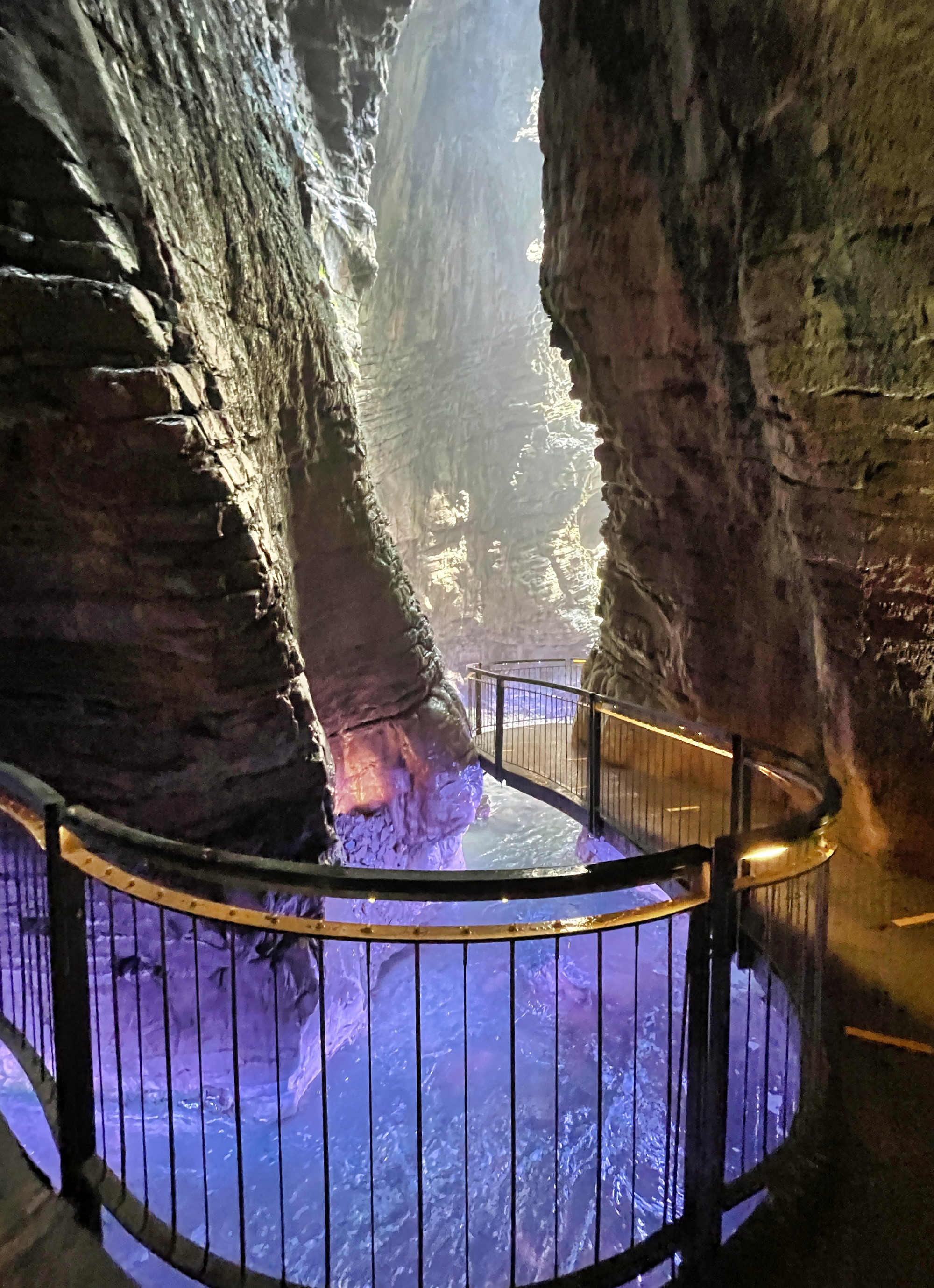 colorfull waterfall in a cave cascate del varone at riva del garda