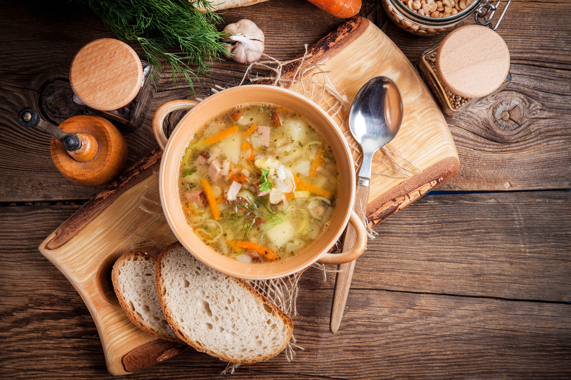 Pea soup with vegetables and bacon.