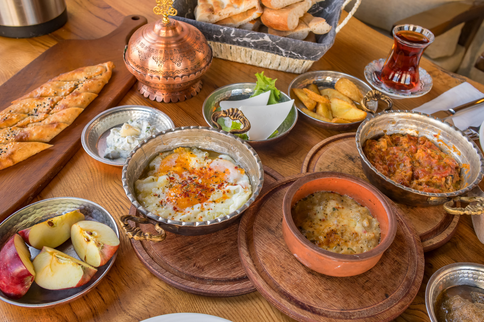 Traditional rich Turkish village breakfast on the wooden table