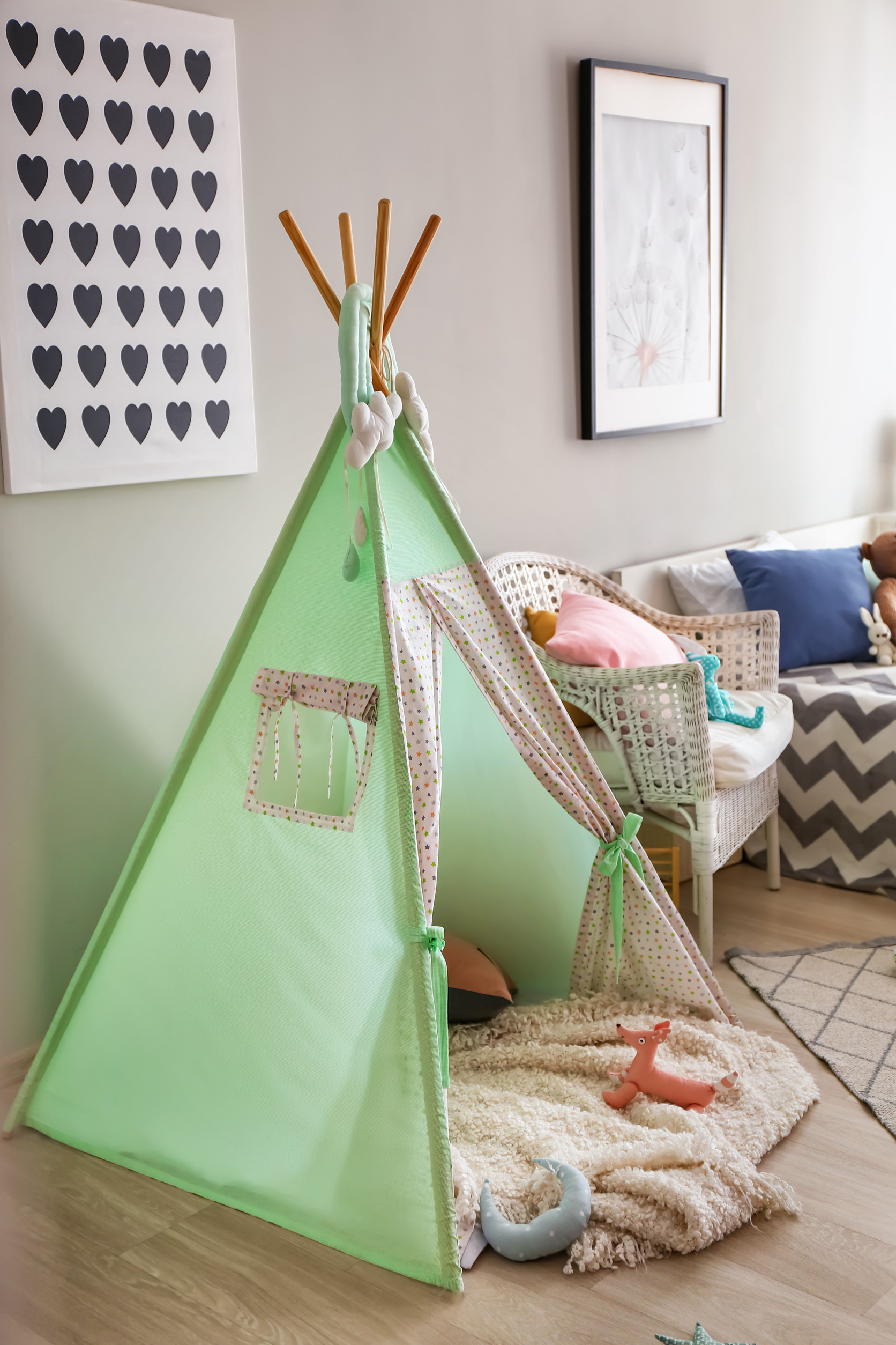 Cozy play tent for kids in interior of room�