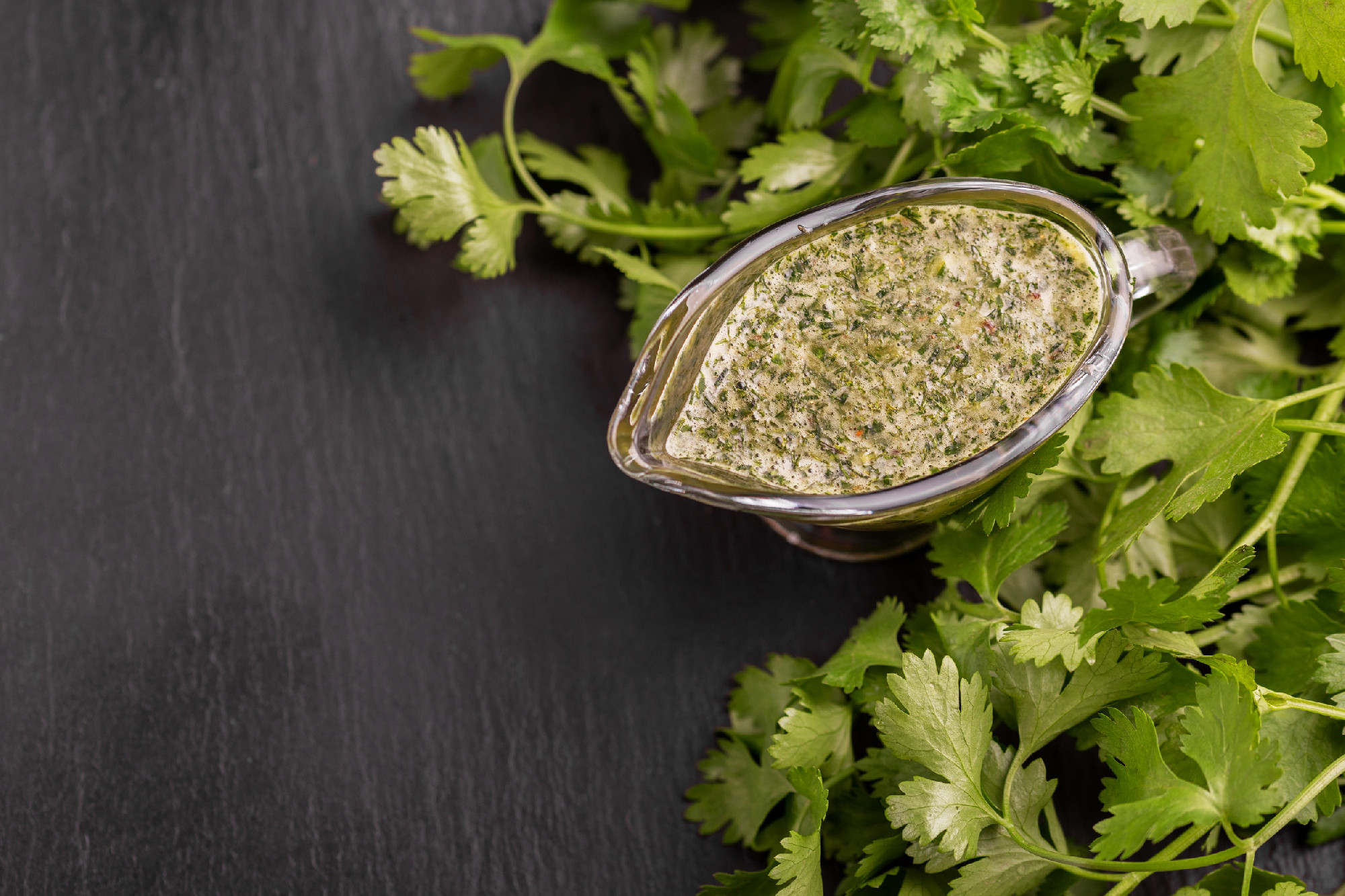 Green sweet and sour homemade sauce with cilentro
