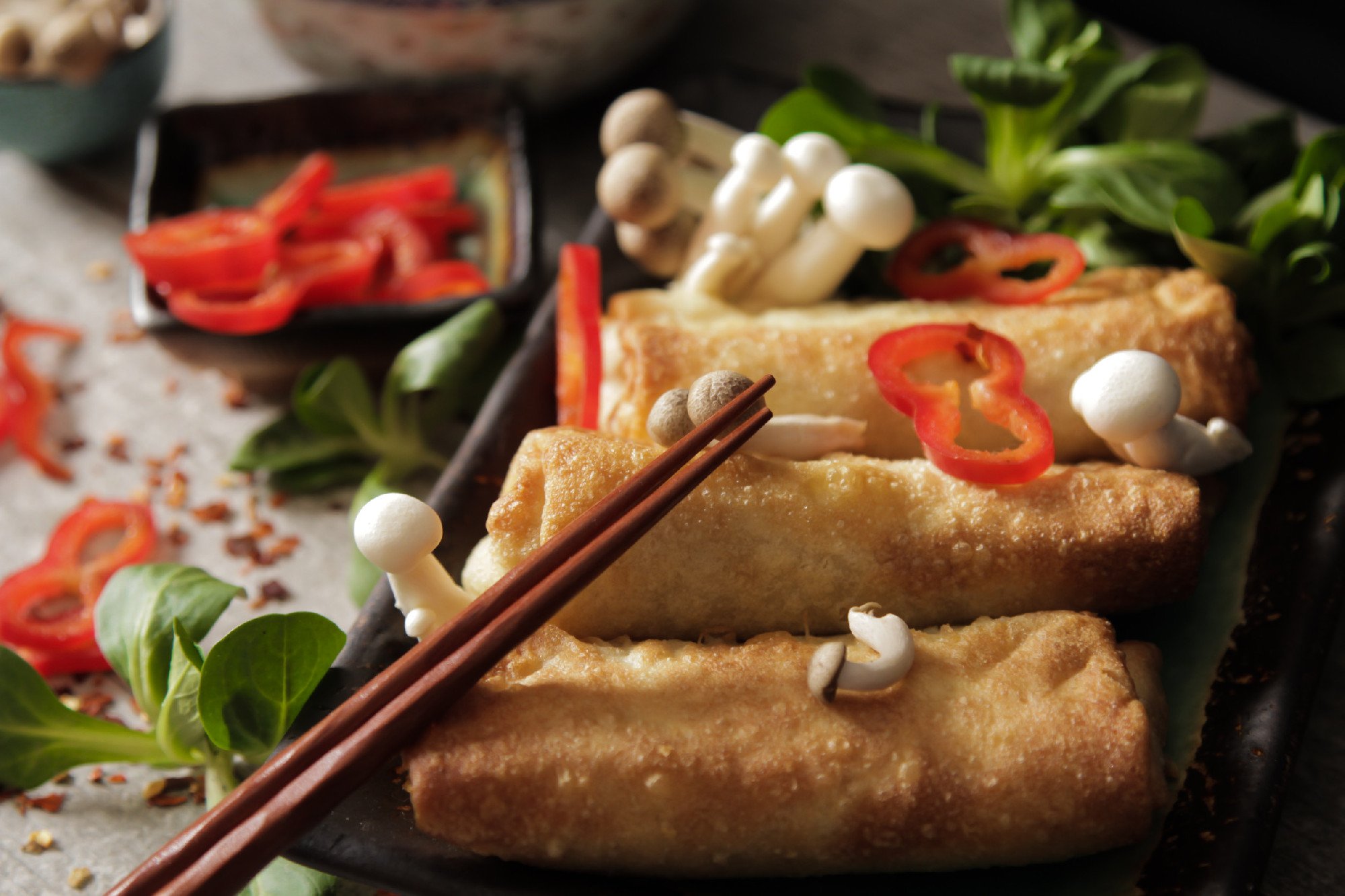Japanese food style. Fried spring rolls with vegetables and shim