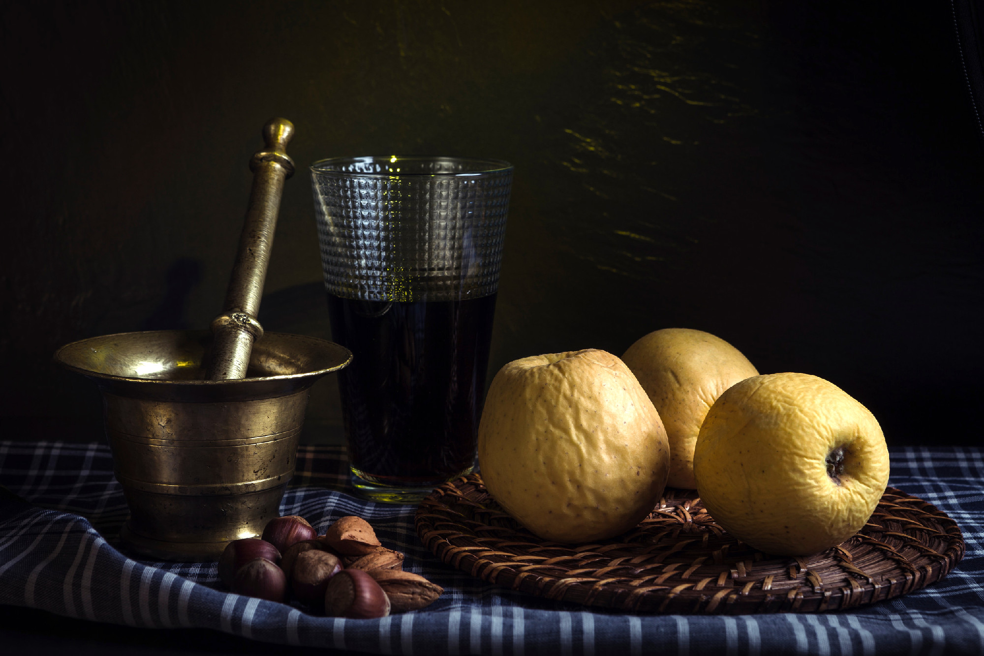 Still life with apples, wine and nuts