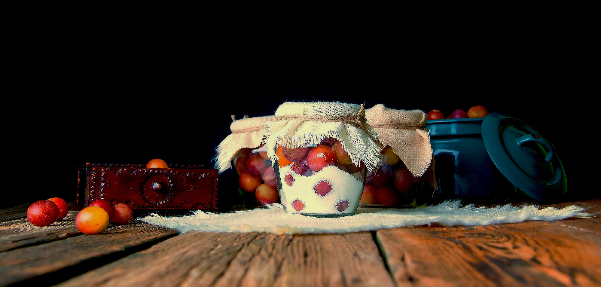 Preparation of plums with sugar in jars for winter