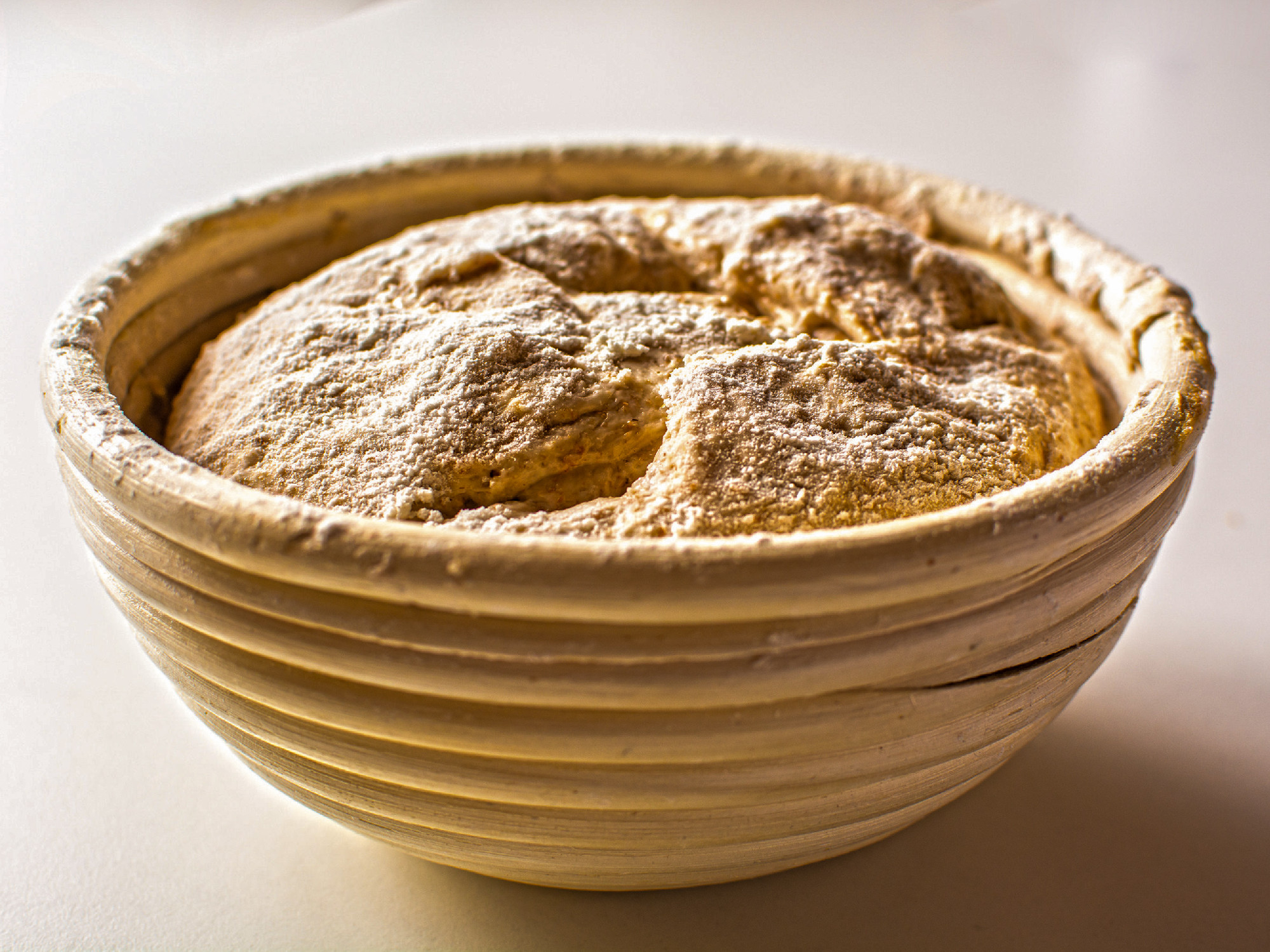 Bread dough raw in proofing basket 