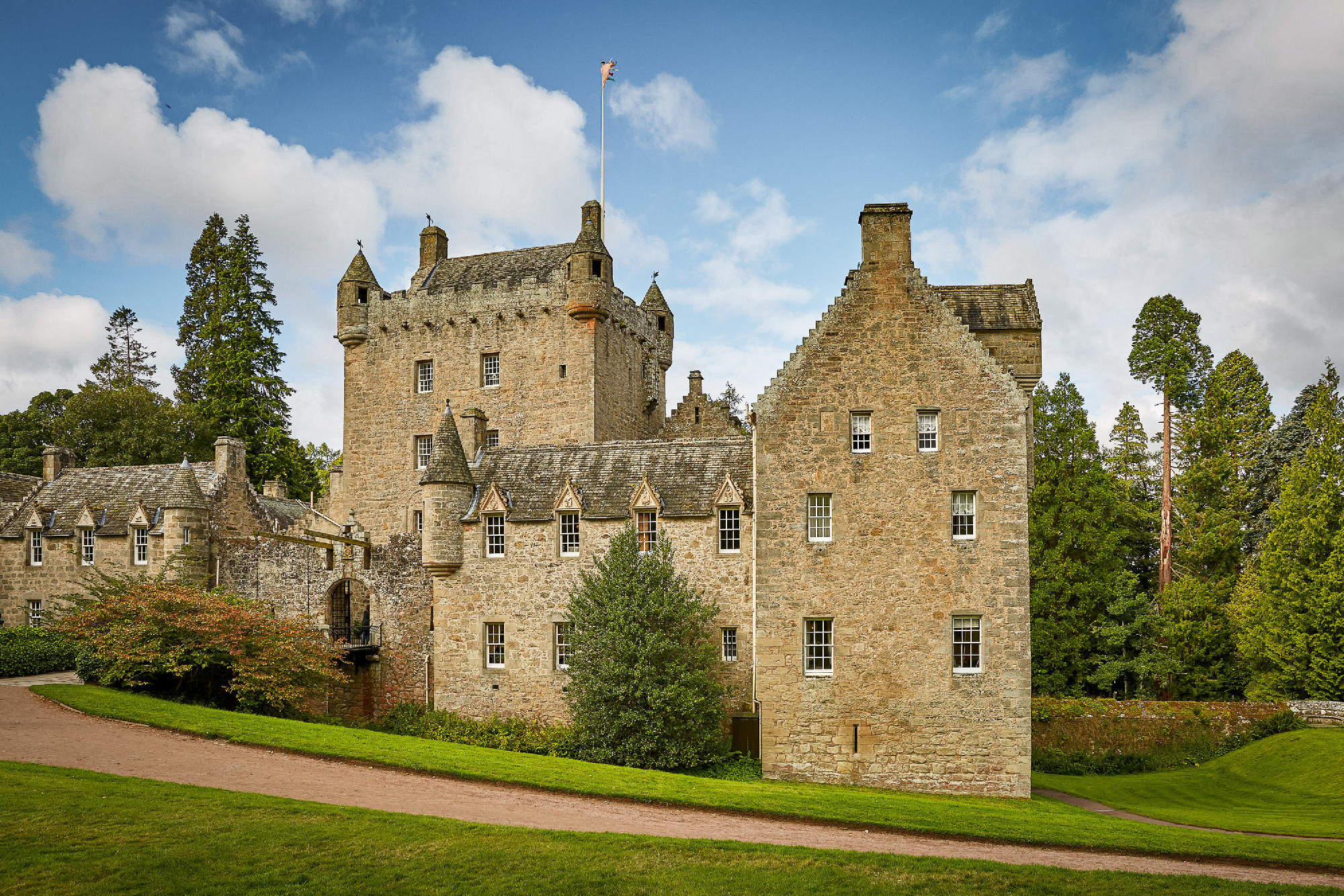 Front of Cawdor Castle with turret and drawbridge with bell and 
