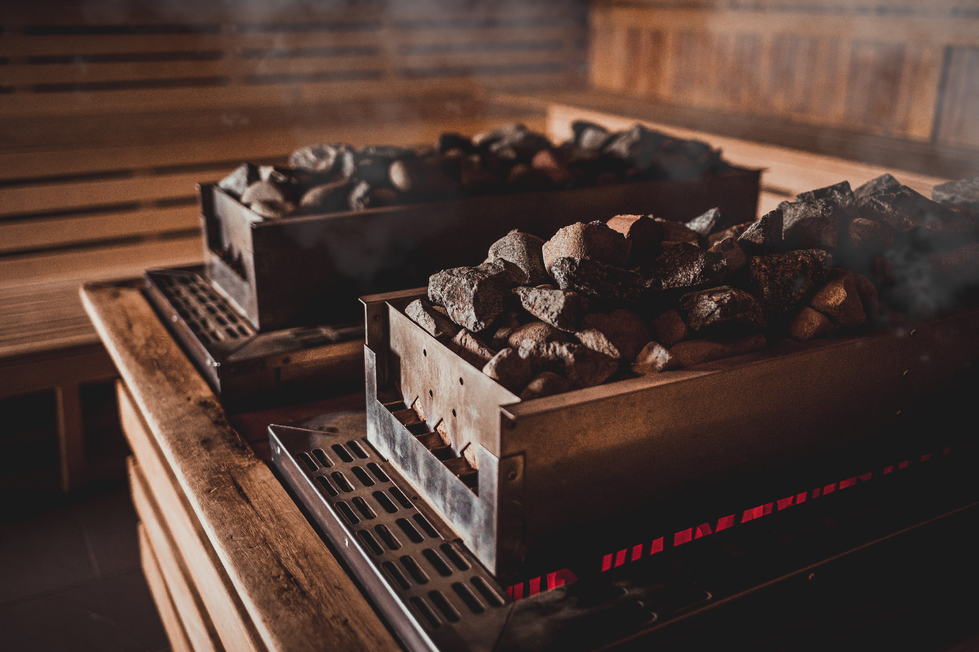 Sauna heater with hot stones