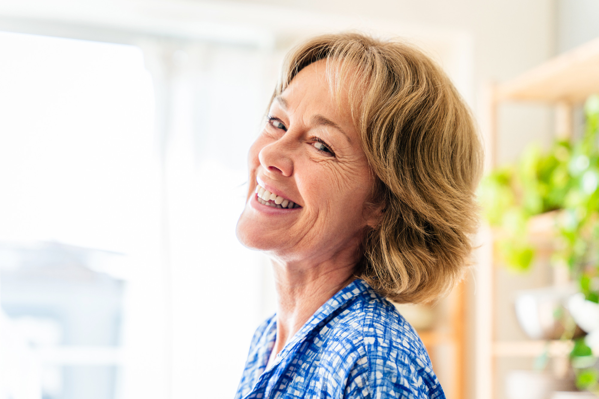 Beautiful mature senior woman at home