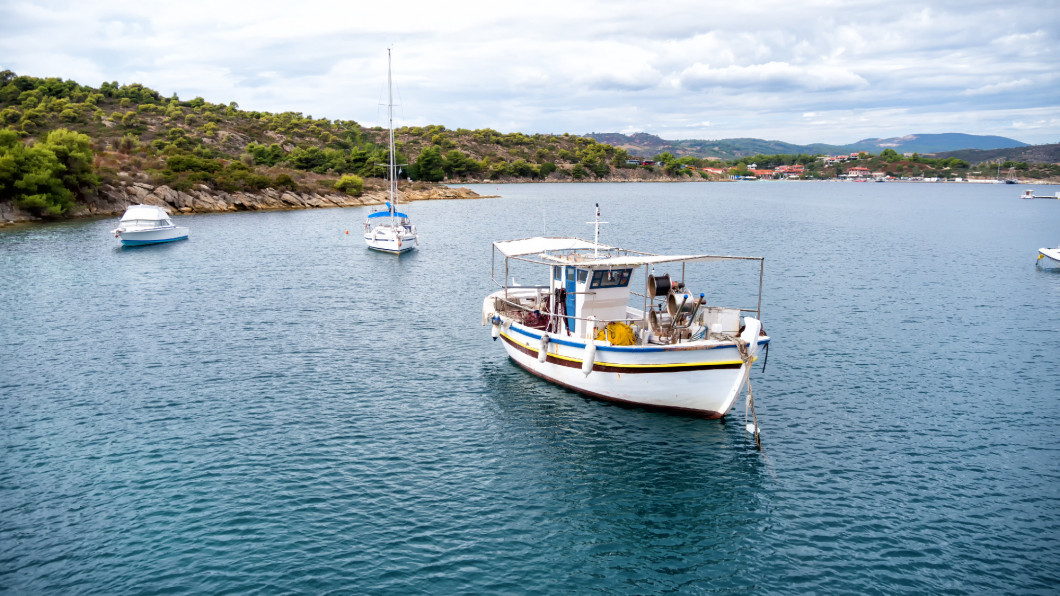 Aerial panoramic view of a marina with boats in Chalkidiki, Gree