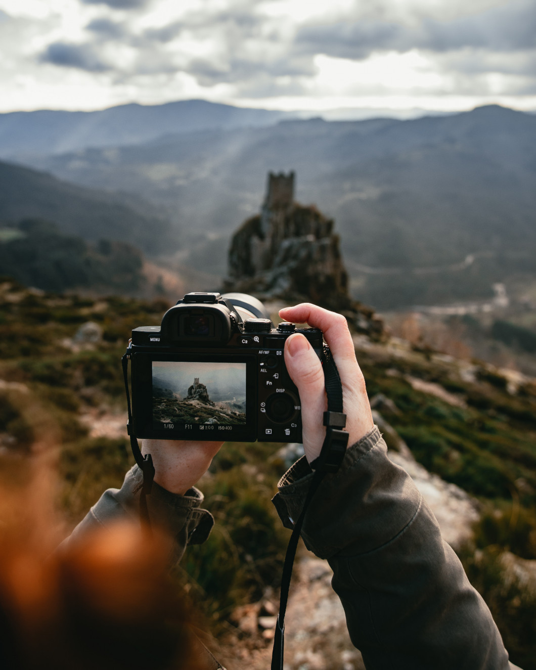 Shooting medieval tower ruins built on a rock