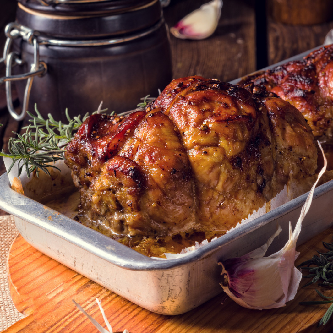 small Rolling roasts fully with dried fruit and bacon