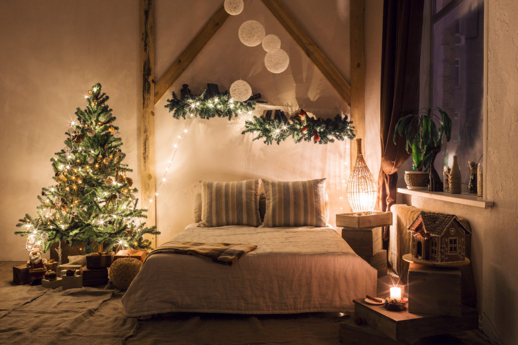 warm and cozy evening in living room. Sofa bed In christmas Interior. concept the new year and holidays.
