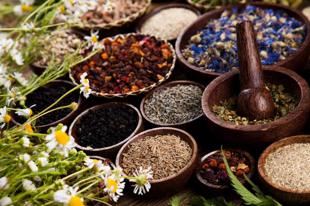 Herbs medicine and vintage wooden background