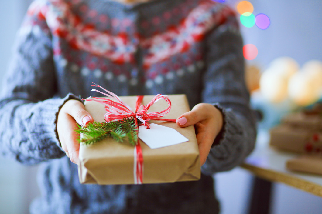 Hands of woman holding christmas gift box. Christmas