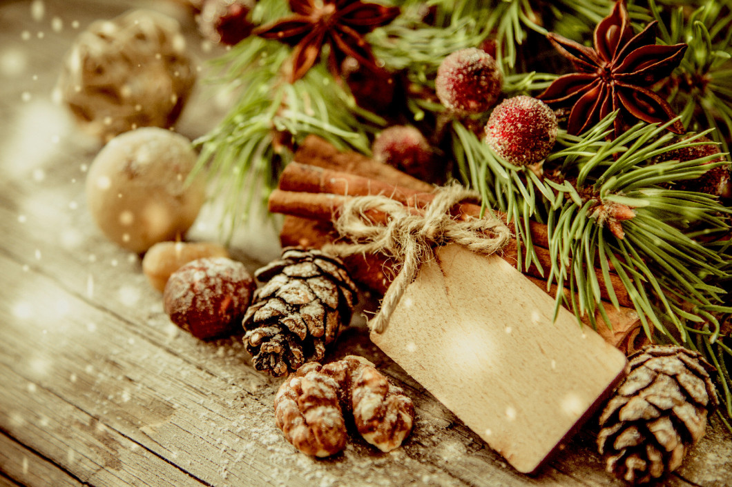 Christmas decorations on rustic wood background