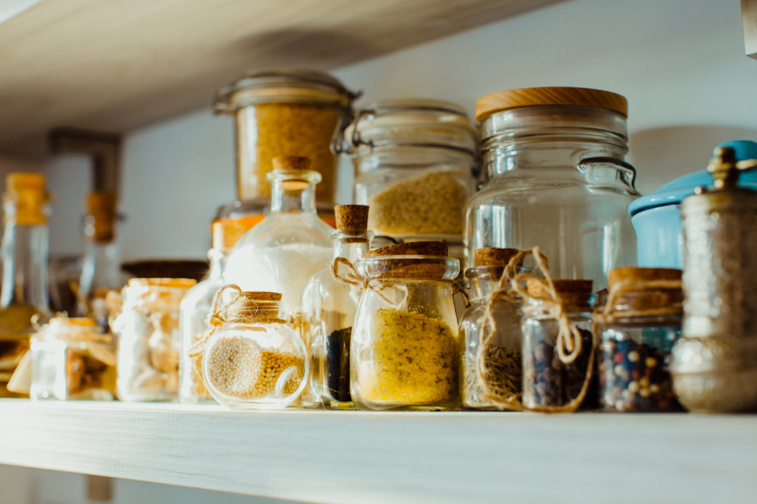 Modern kitchen shelves with various food ingredients