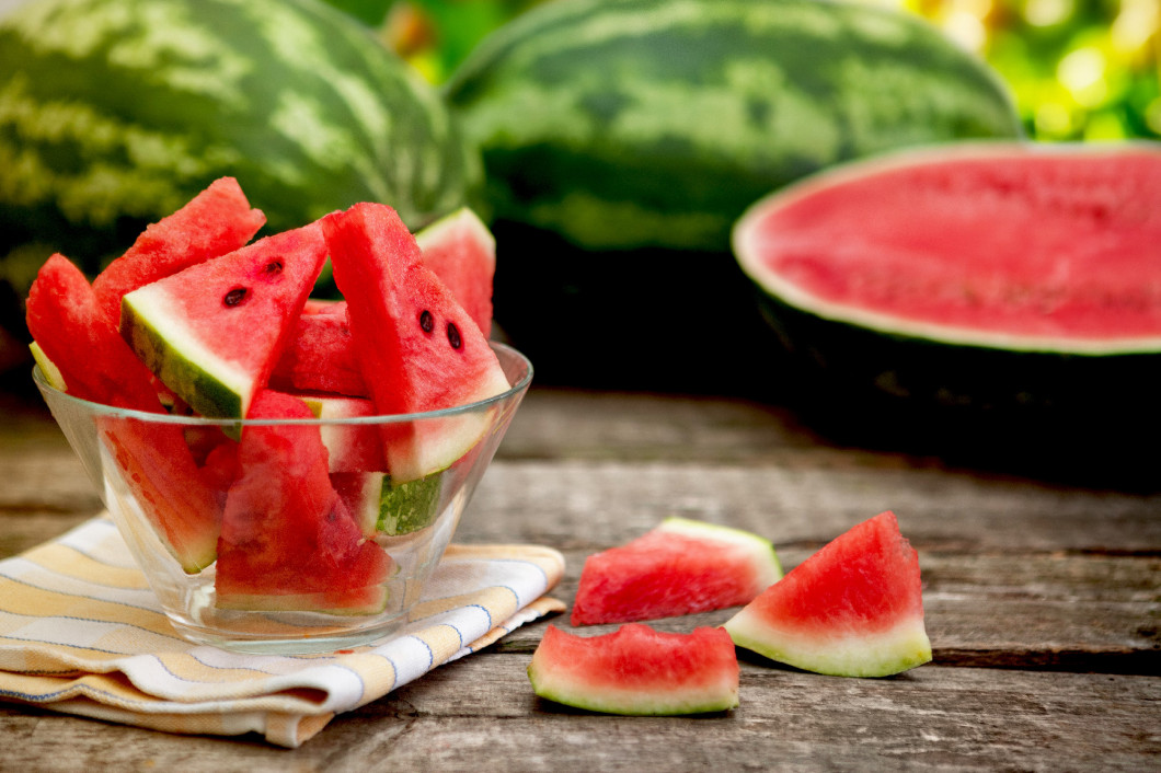 Sliced watermelon in clear glass bowl