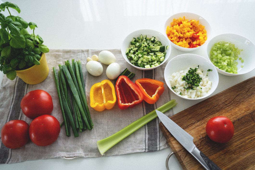 Set of vegetales for cooking gazpacho on white background.