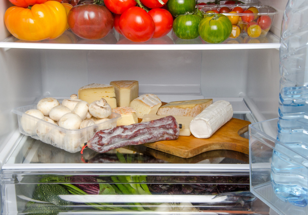 Different food products inside a refrigerator