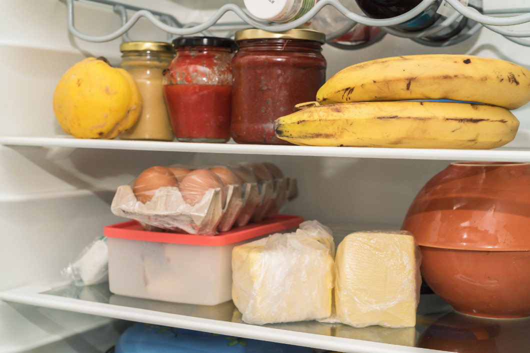 Open fridge with usual food