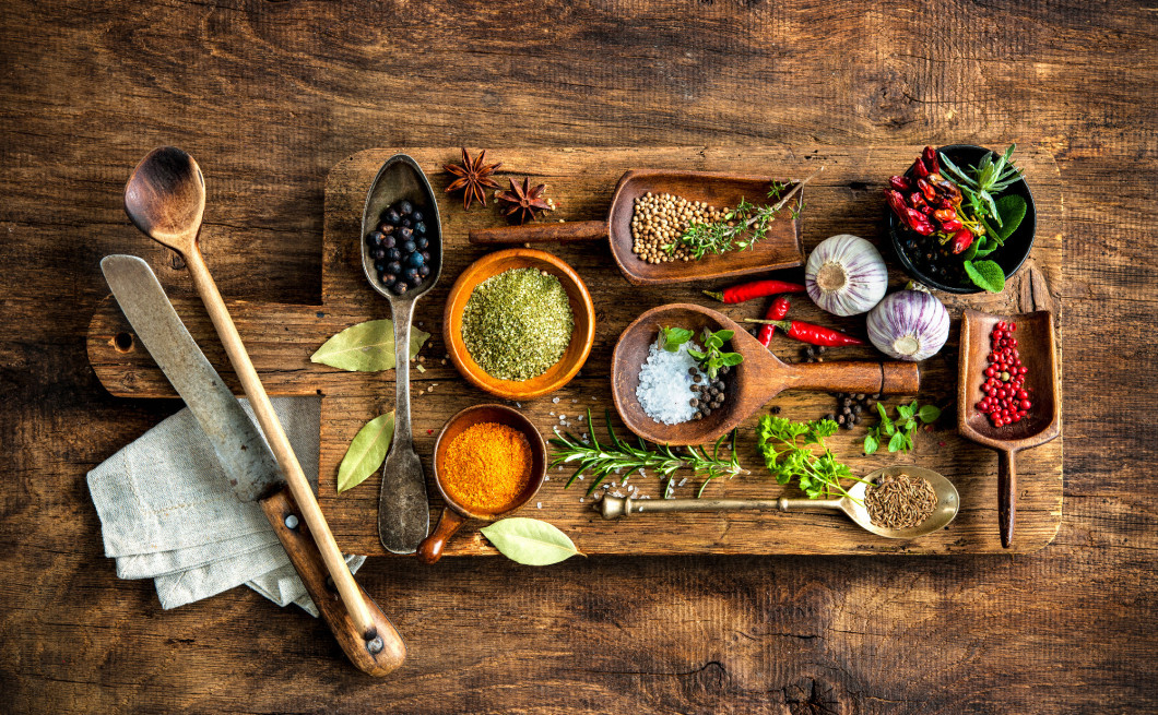 Colorful spices on wooden table