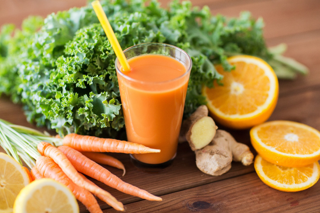 glass of carrot juice, fruits and vegetables