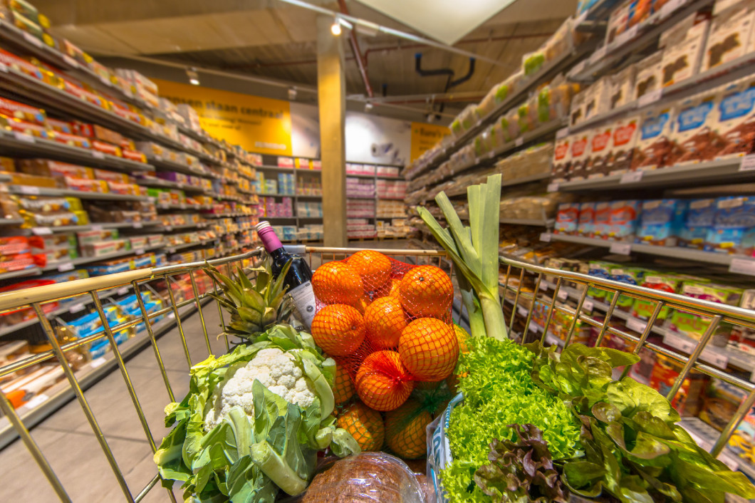 Supermarket cart with products